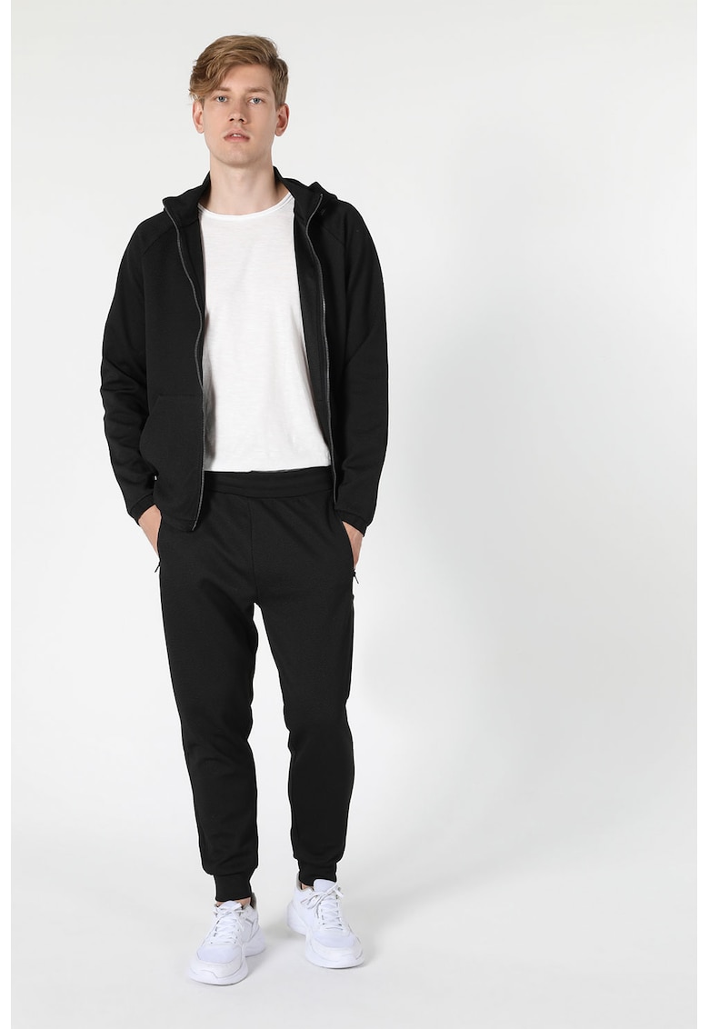 Pantaloni sport uni cu material elastic la nivelul gleznei
