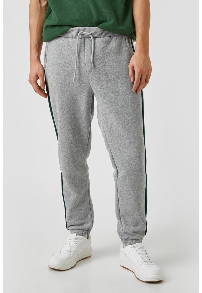 Pantaloni slim fit cu snur si detalii contrastante