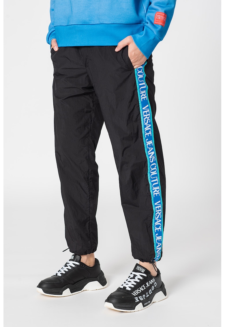 Pantaloni jogger conici cu benzi laterale contrastante Bărbați imagine noua gjx.ro