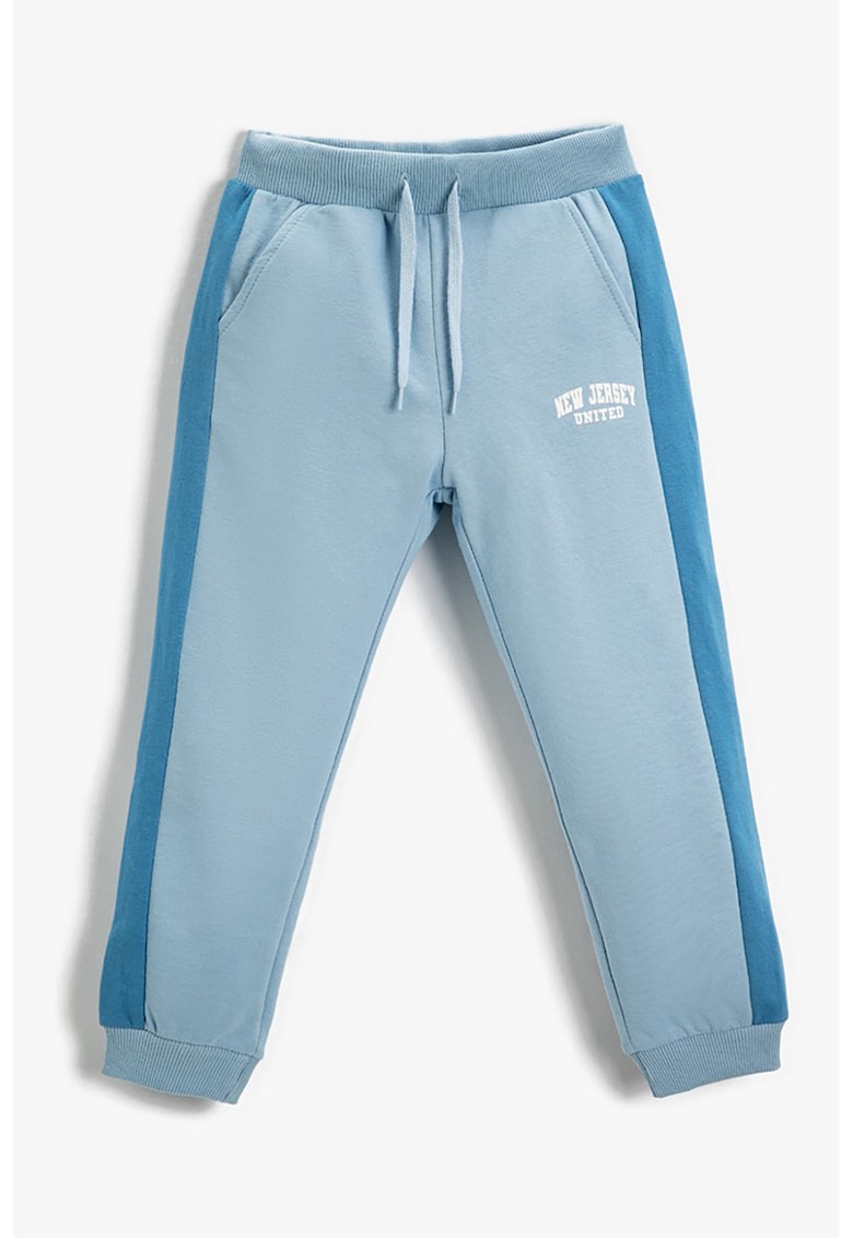 Pantaloni sport cu segmente laterale