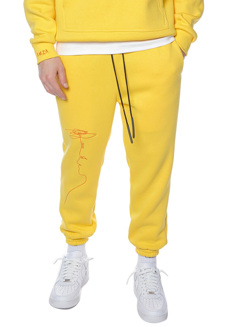 Pantaloni sport cu detaliu cu imprimeu grafic scribble