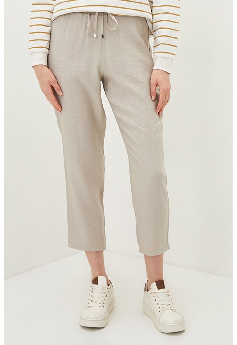 Pantaloni conici cu buzunare oblice