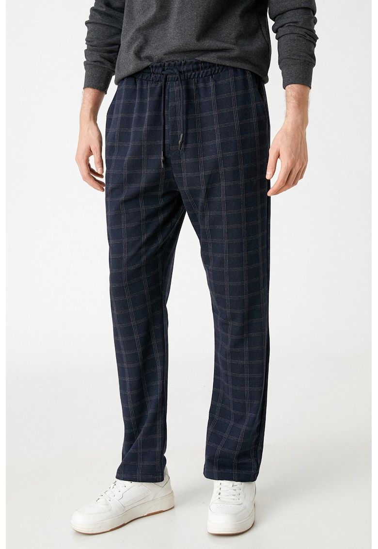 Pantaloni conici in carouri