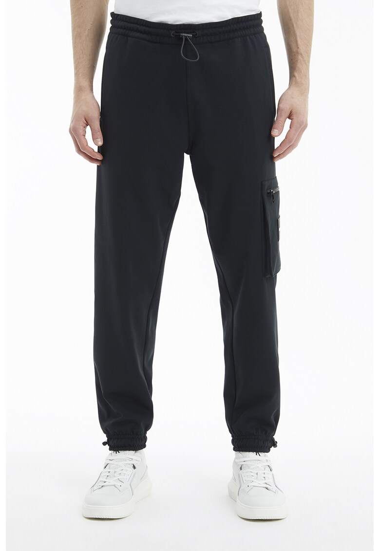 Pantaloni jogger cargo cu croiala conica