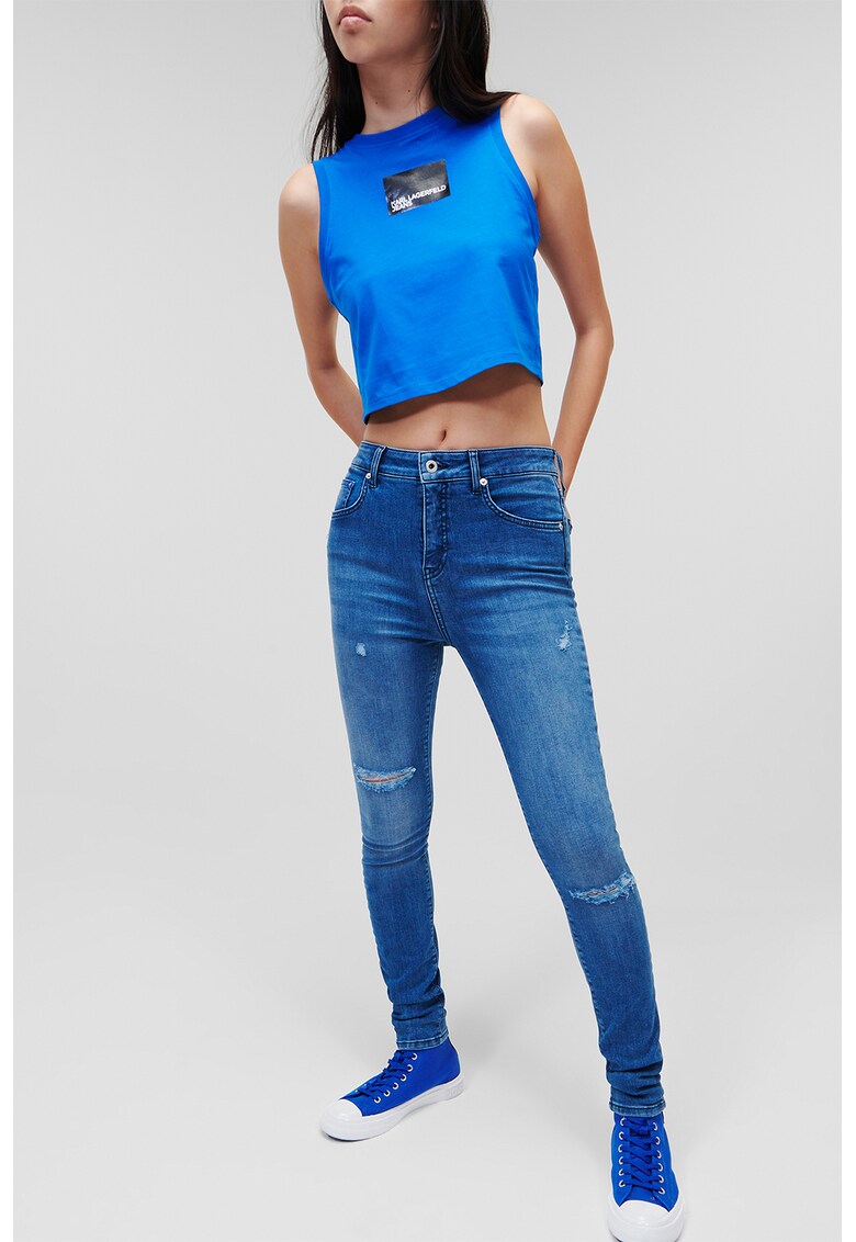 Blugi skinny din amestec de bumbac organic cu rupturi decorative