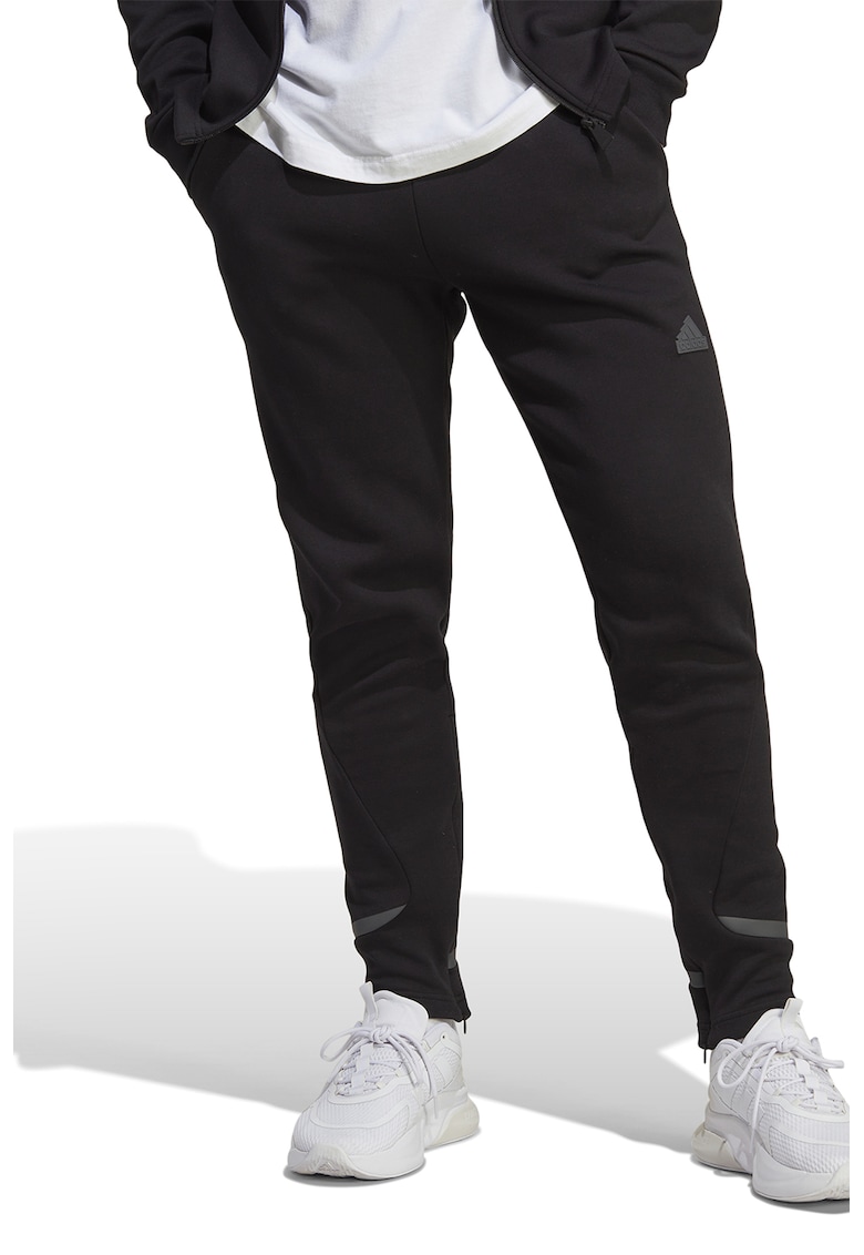 Pantaloni sport slim fit cu buzunae oblice - Negru