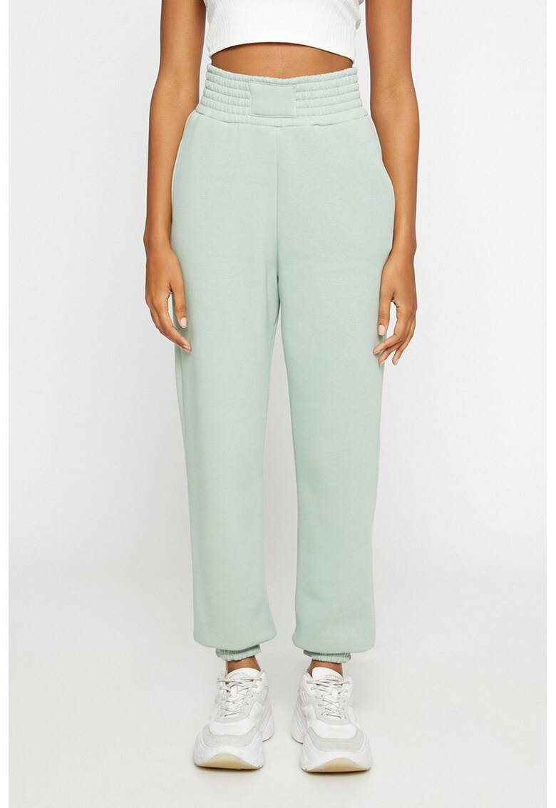 Pantaloni sport cu buzunare laterale