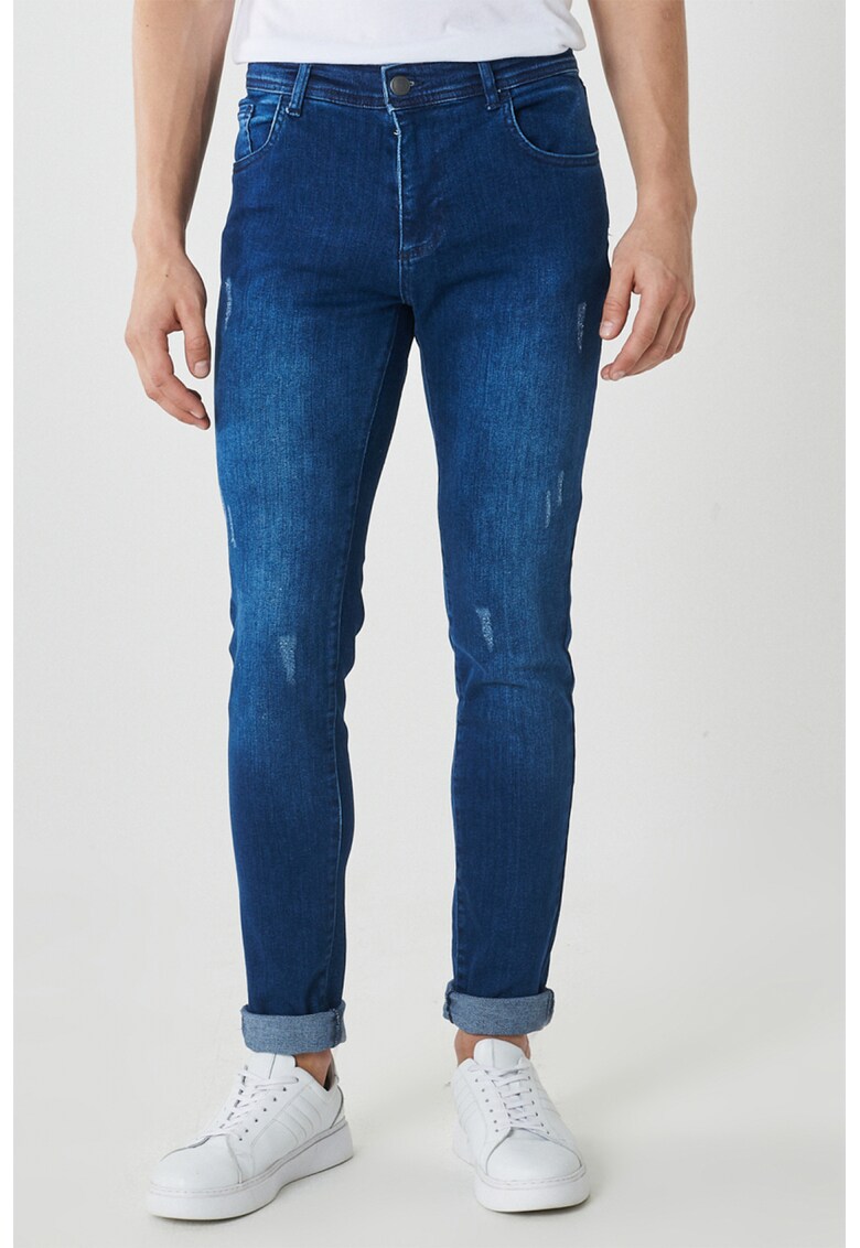 Blugi extra slim fit cu aspect deteriorat