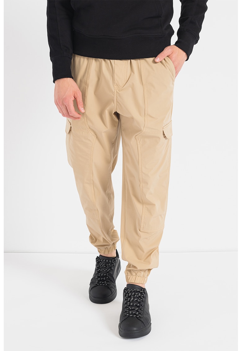 Pantaloni cargo conici