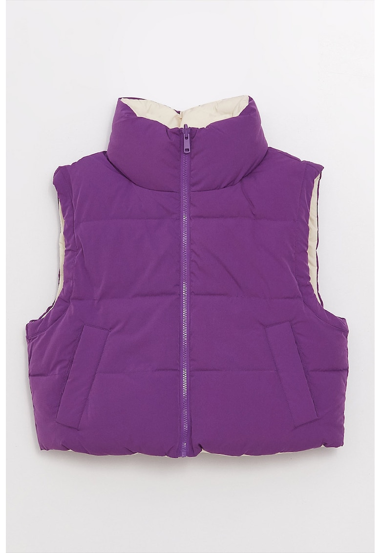 Vesta crop reversibila
