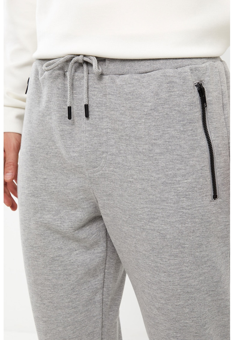 Pantaloni de trening din amestec de bumbac cu buzunare cu fermoar