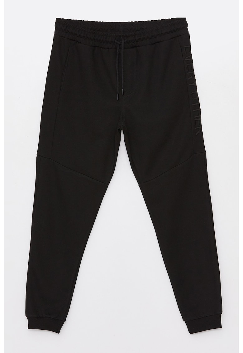 Pantaloni sport conici cu snur in talie