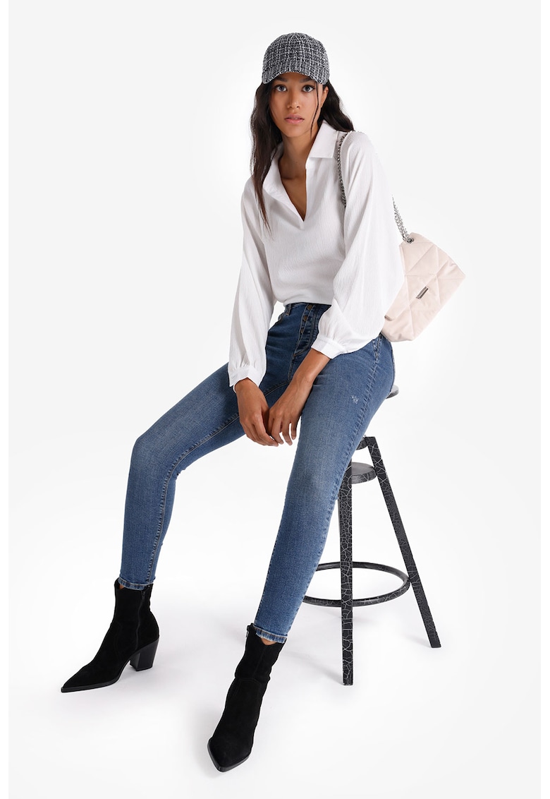 Blugi skinny cu nasturi