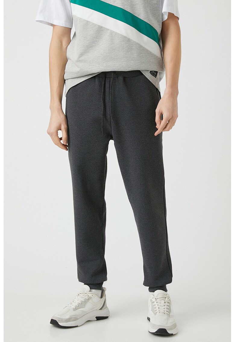 Pantaloni de trening cu snur de ajustare