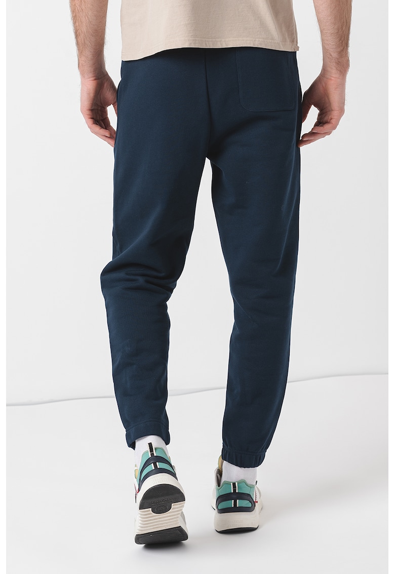 Pantaloni de trening cu croiala conica