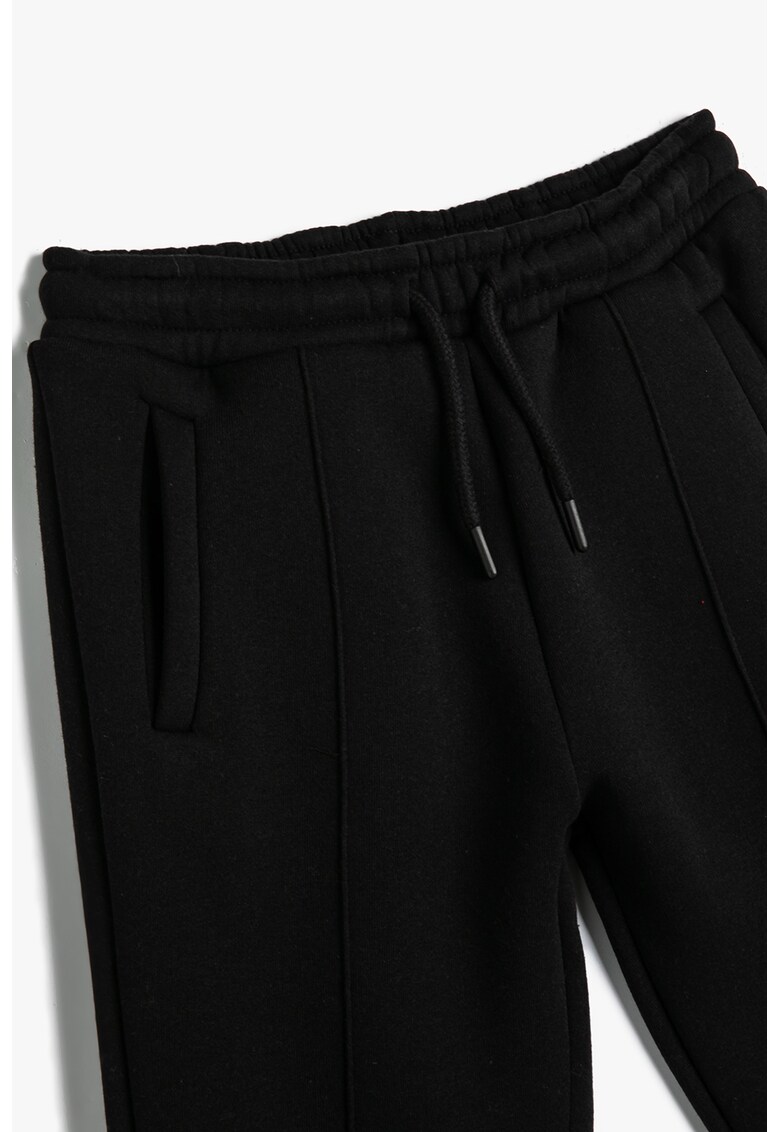 Pantaloni de trening cu snururi de ajustare si buzunare laterale