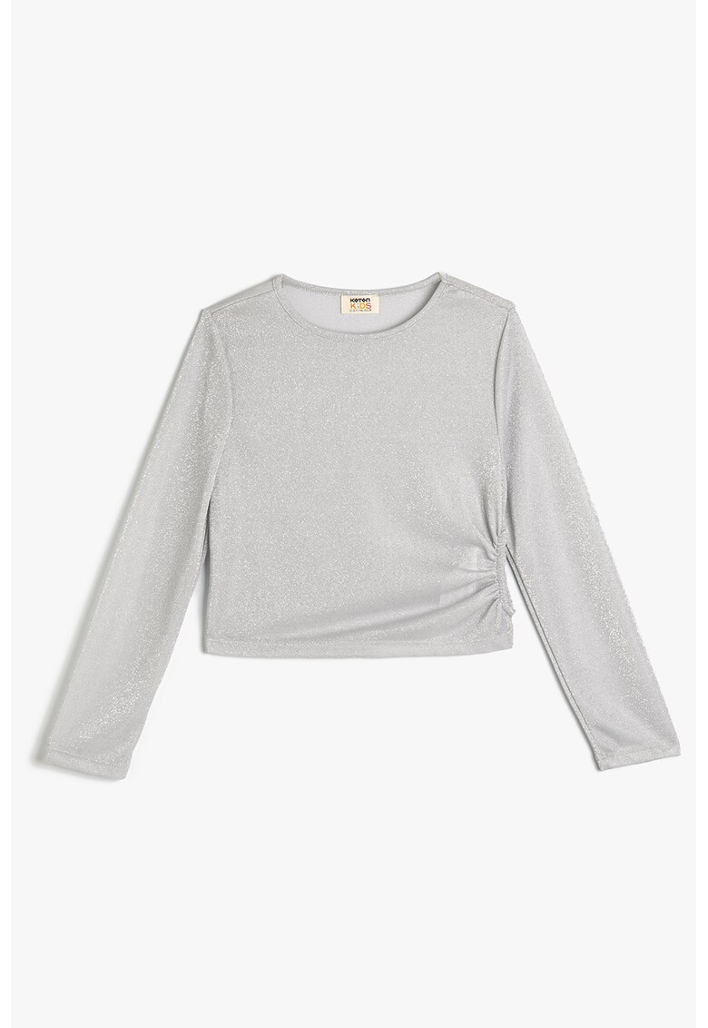 Bluza stralucitoare cu decupaj lateral