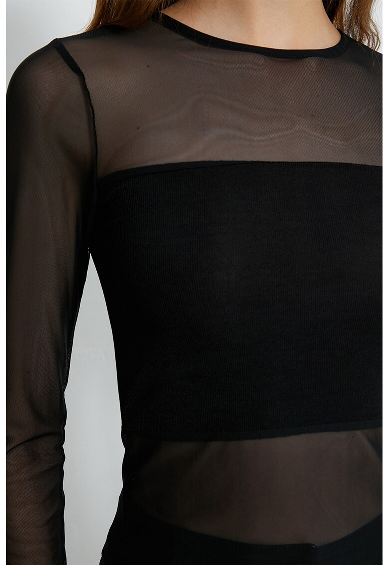 Bluza cu segmente semi-transparente
