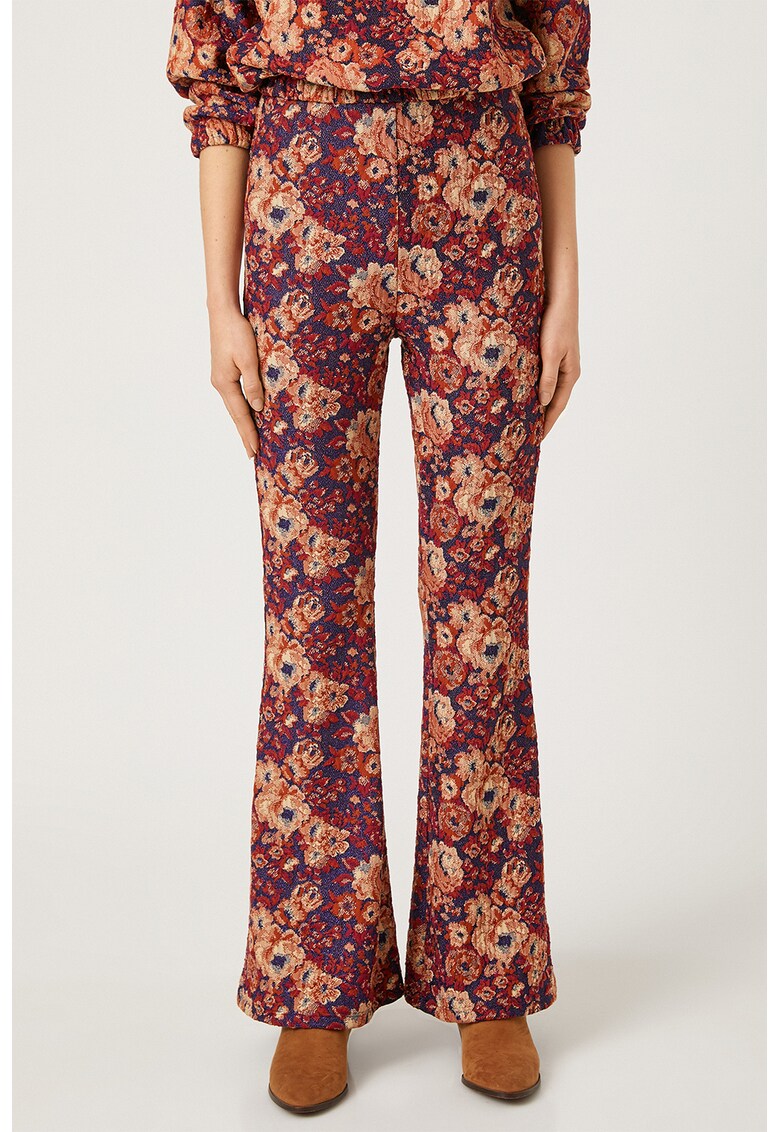 Pantaloni evazati cu model floral