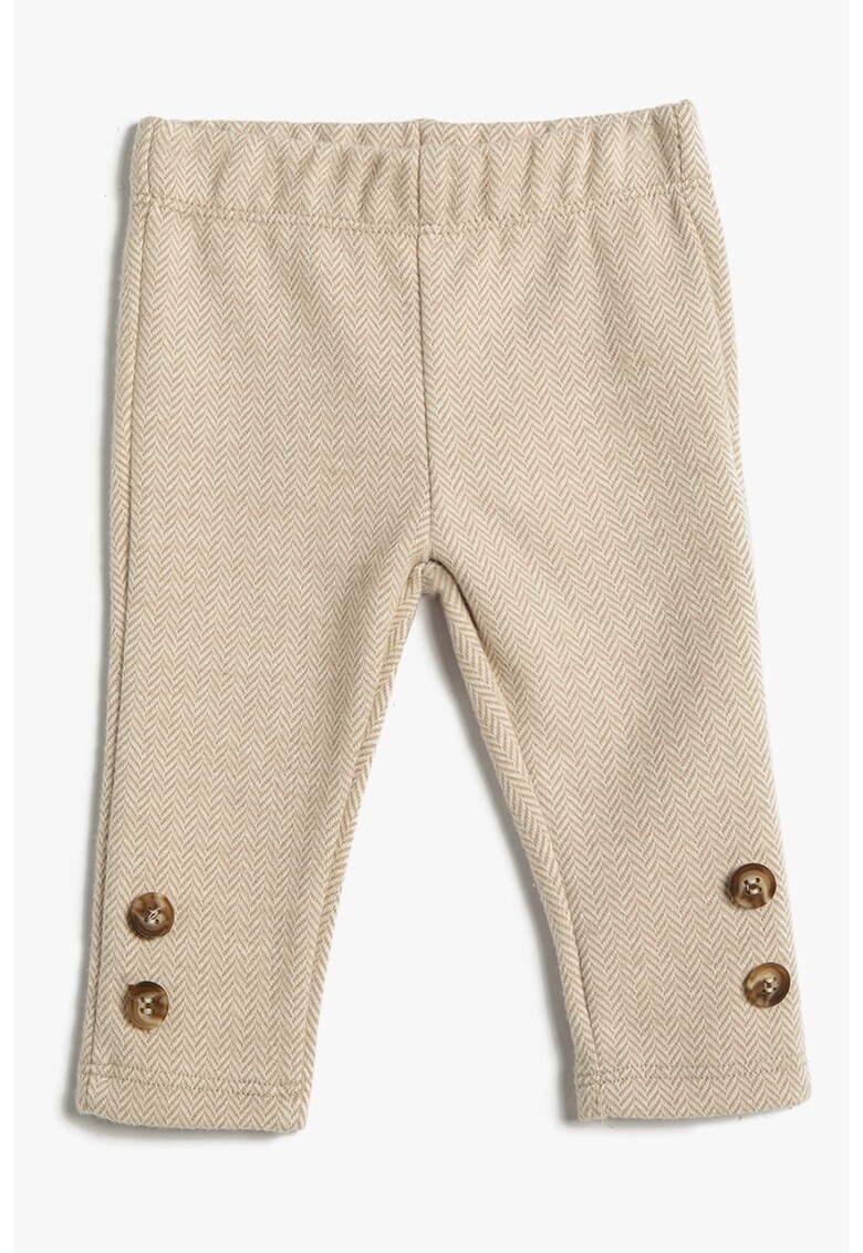 Pantaloni cu nasturi decorativi