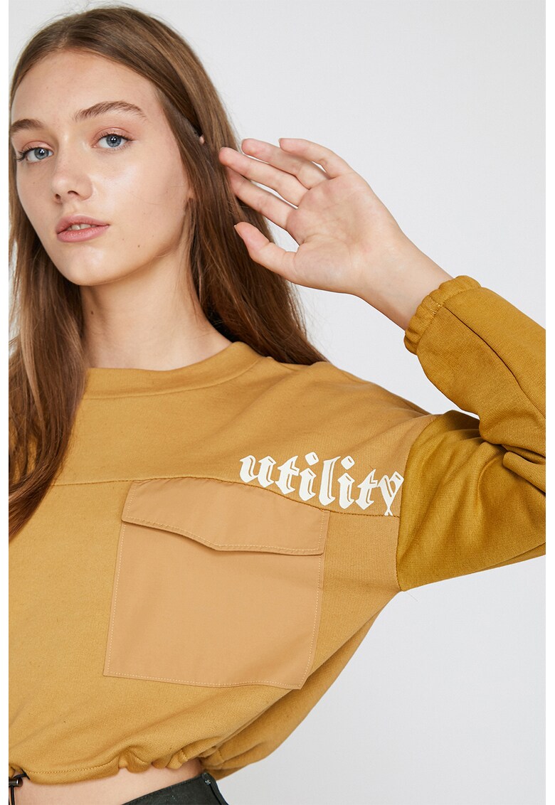 Bluza crop cu buzunare pe piept