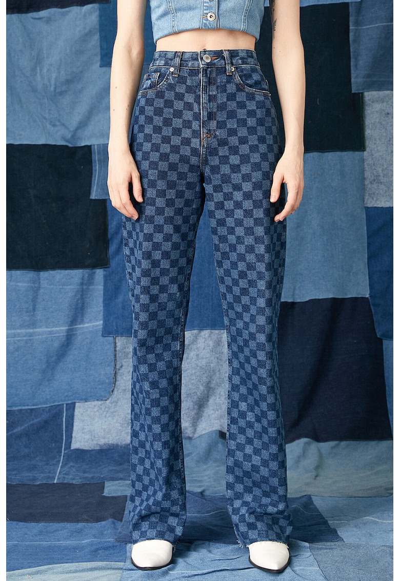 Blugi bootcut in carouri