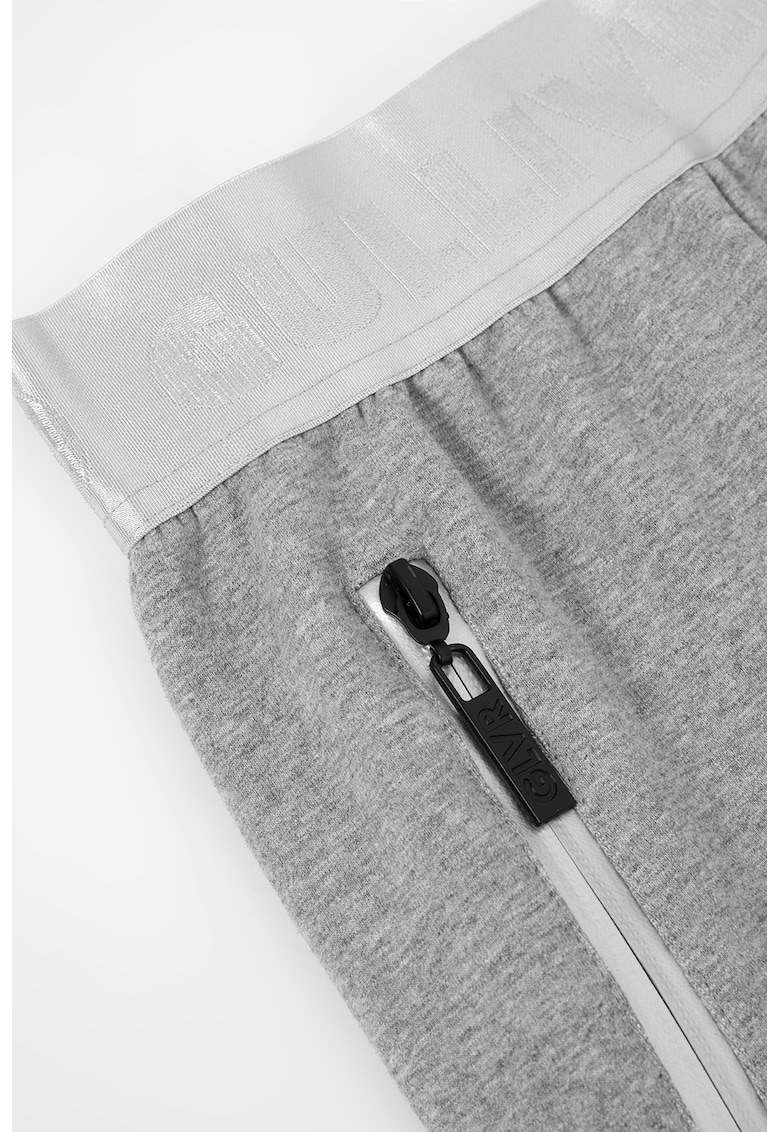 Pantaloni de trening cu buzunare cu fermoar