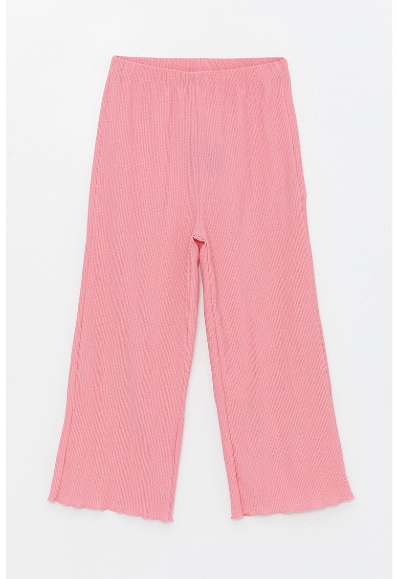 Pantaloni cu croiala ampla si buzunare oblice
