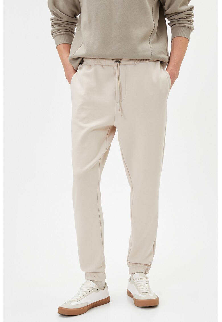 Pantaloni de trening uni cu snur