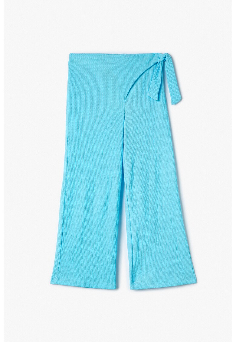 Pantaloni evazati cu aspect tetxurat