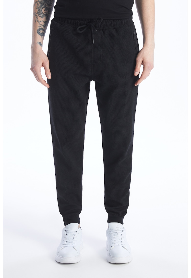 Pantaloni conici de trening cu snur