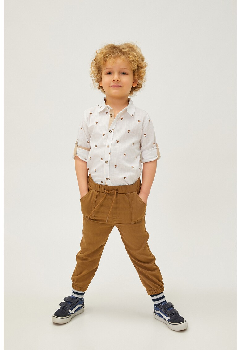 Pantaloni cu buzunare oblice