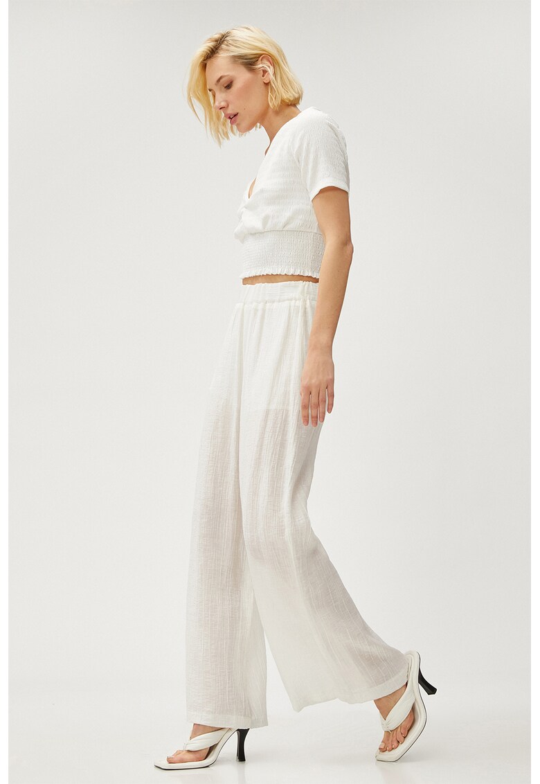 Bluza crop cu decolteu in V si insertii elastice