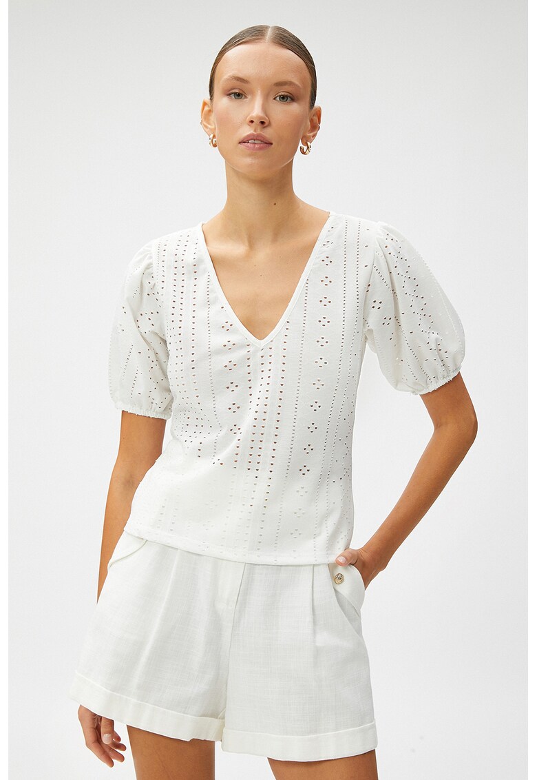 Bluza cu decolteu in V si decupaje discrete