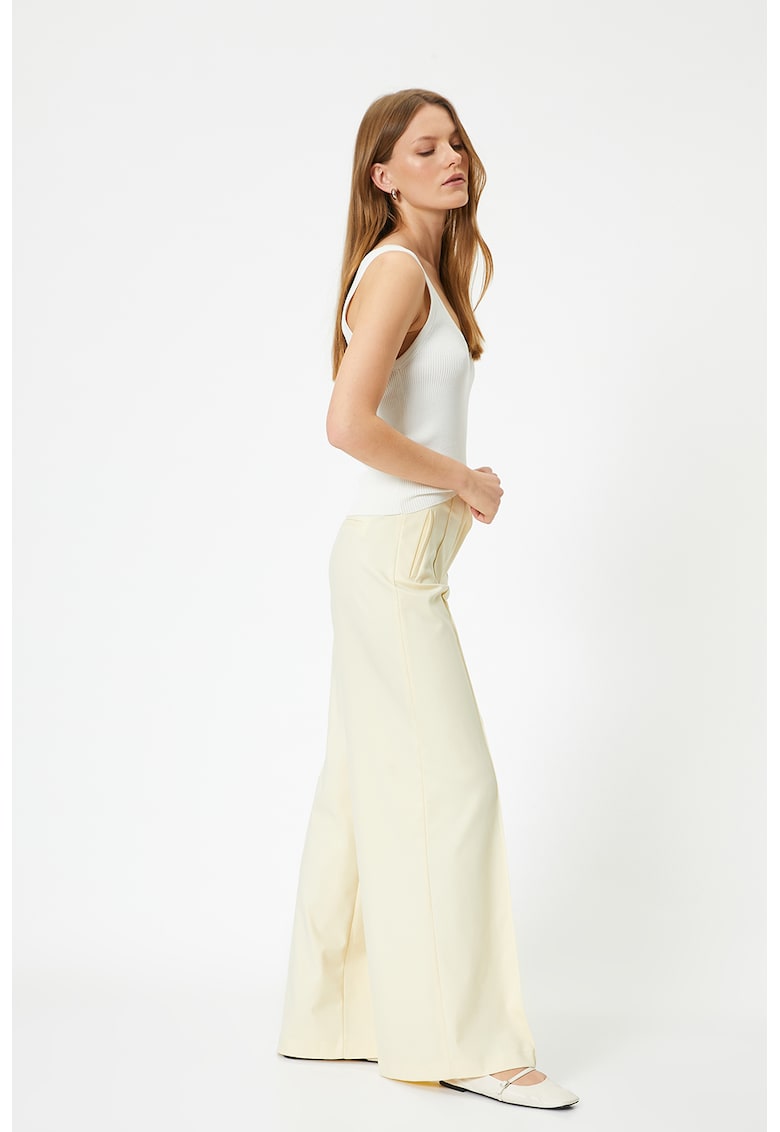 Pantaloni eleganti cu talie inalta si croiala ampla