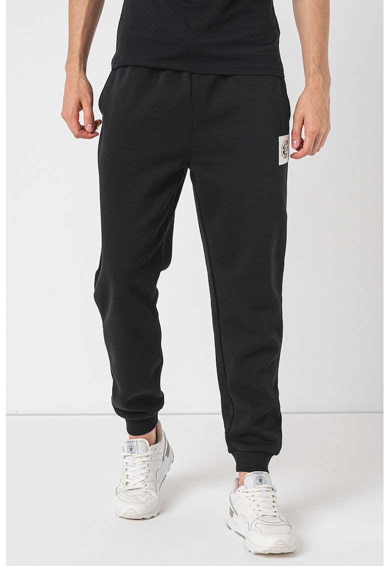 Pantaloni de trening conici cu buzunare oblice