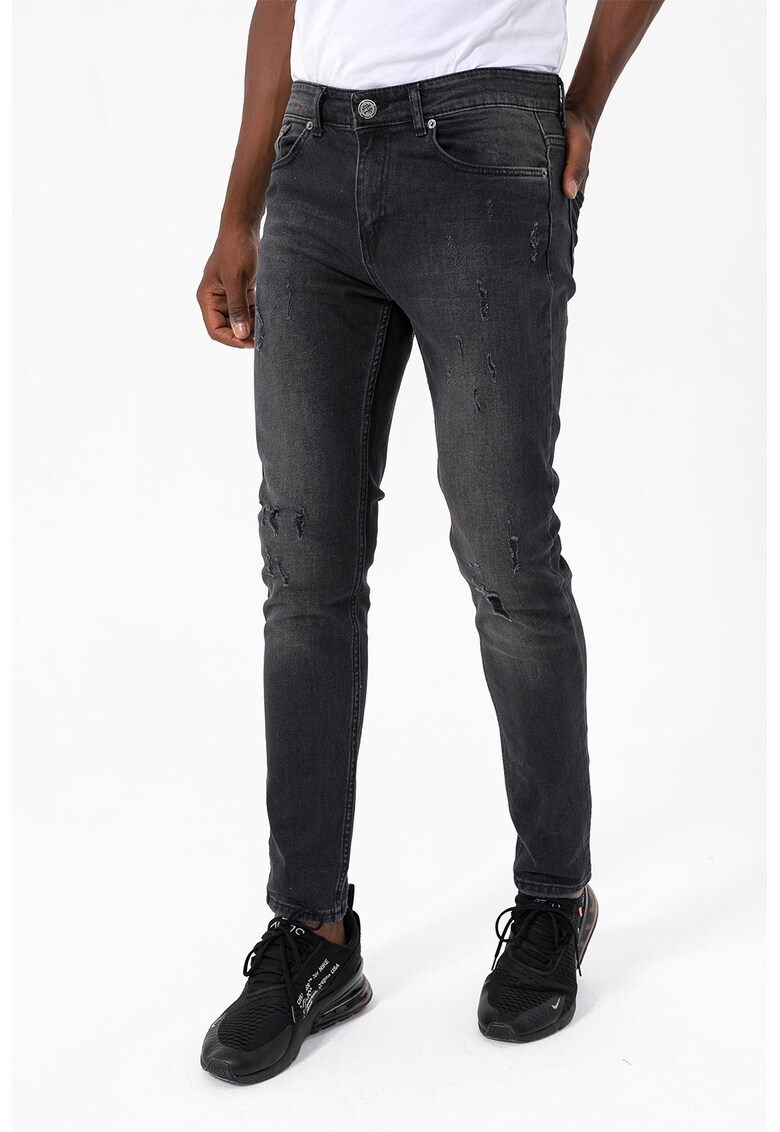 Blugi slim fit cu aspect deteriorat