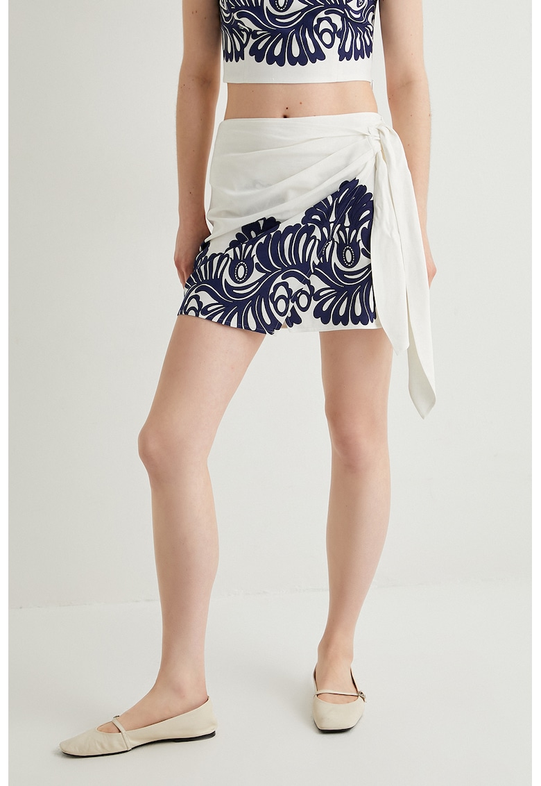 Fusta mini cu detaliu suprapus