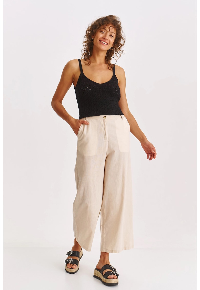 Pantaloni crop cu croiala ampla si buzunare oblice