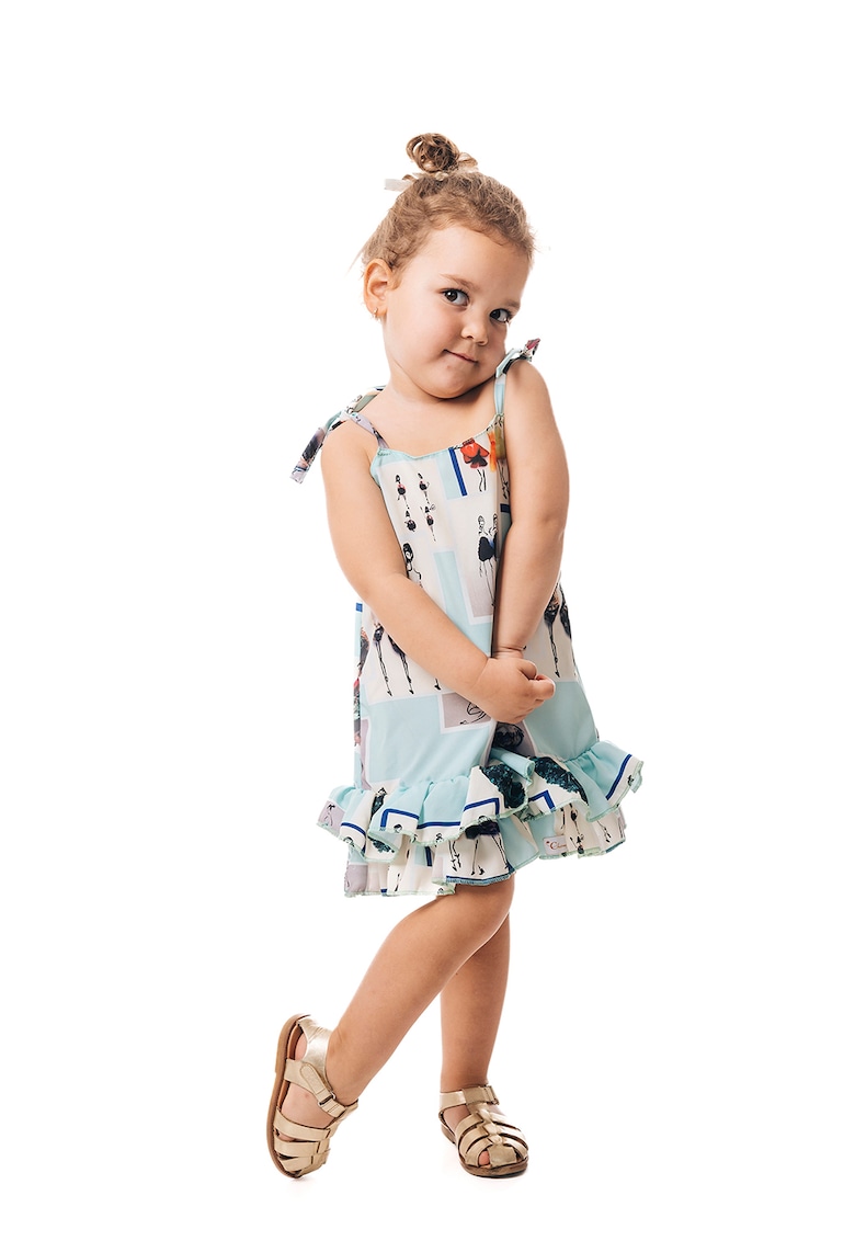 Rochie cu model grafic si terminatie peplum