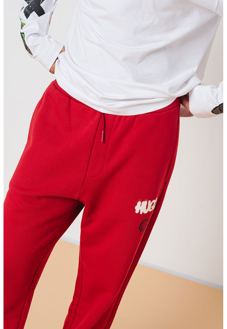 Pantaloni de trening de bumbac cu buzunare laterale