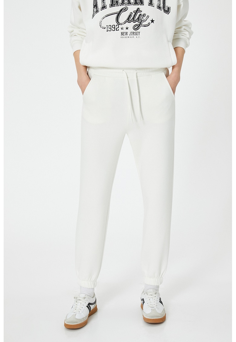 Pantaloni de trening crop cu buzunare oblice