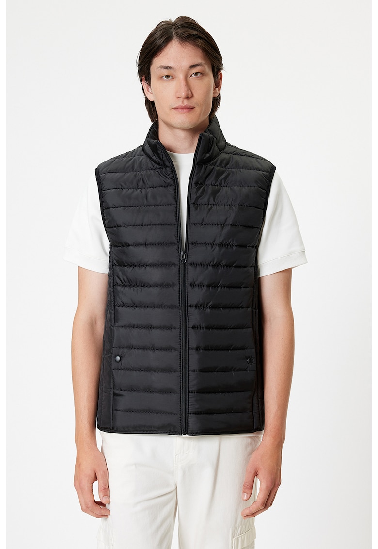 Vesta cu model uni si aspect matlasat