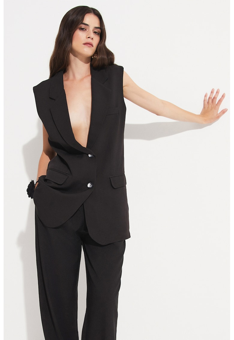 Vesta cu buzunare cu clapa