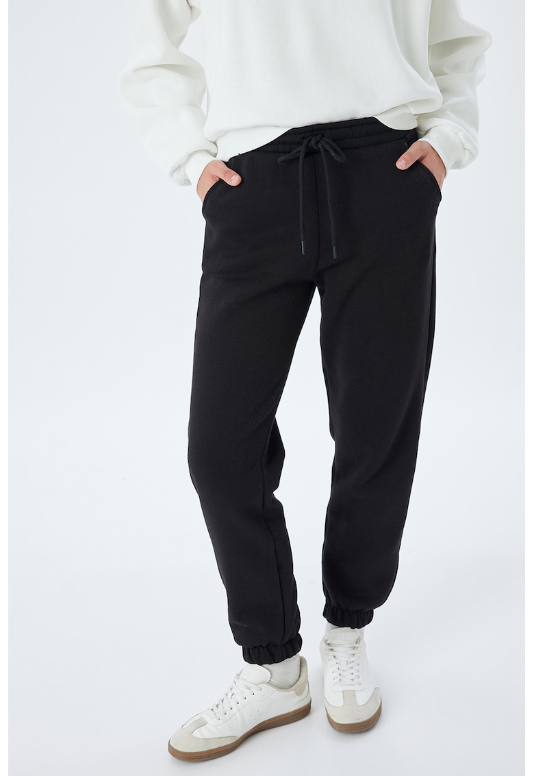 Pantaloni de trening cu buzunare oblice