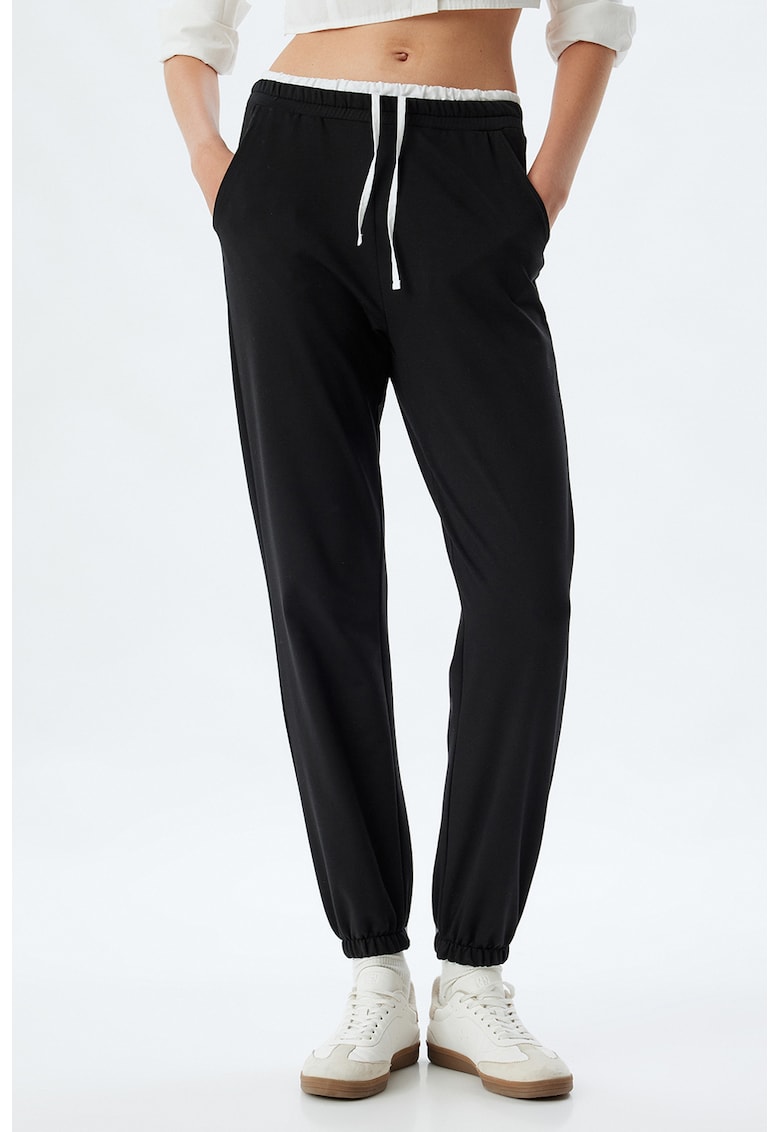 Pantaloni de trening cu buzunare oblice
