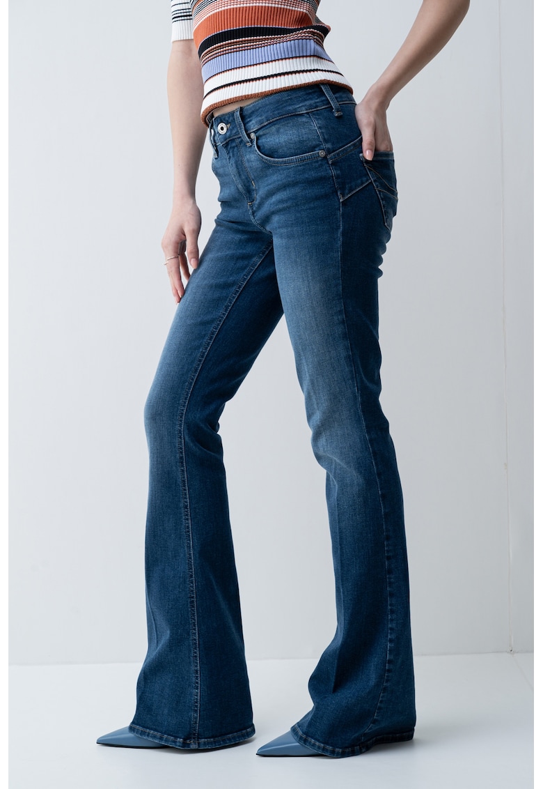 Blugi evazati cu model uni