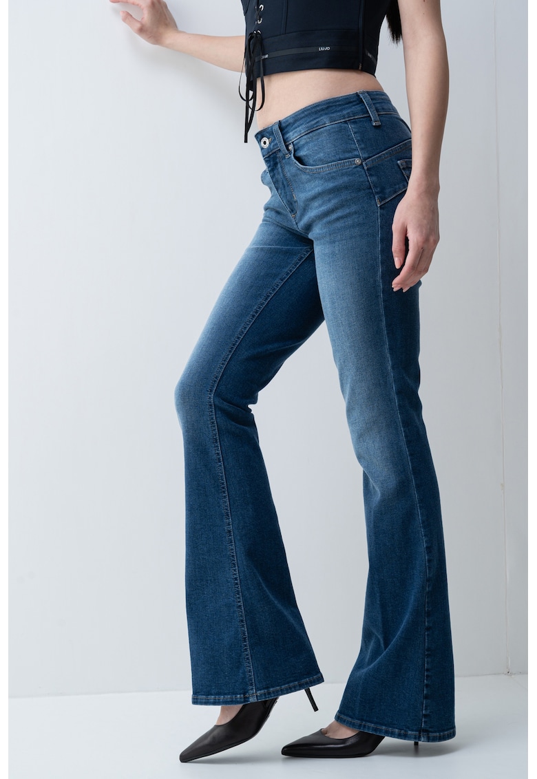 Blugi evazati cu model uni