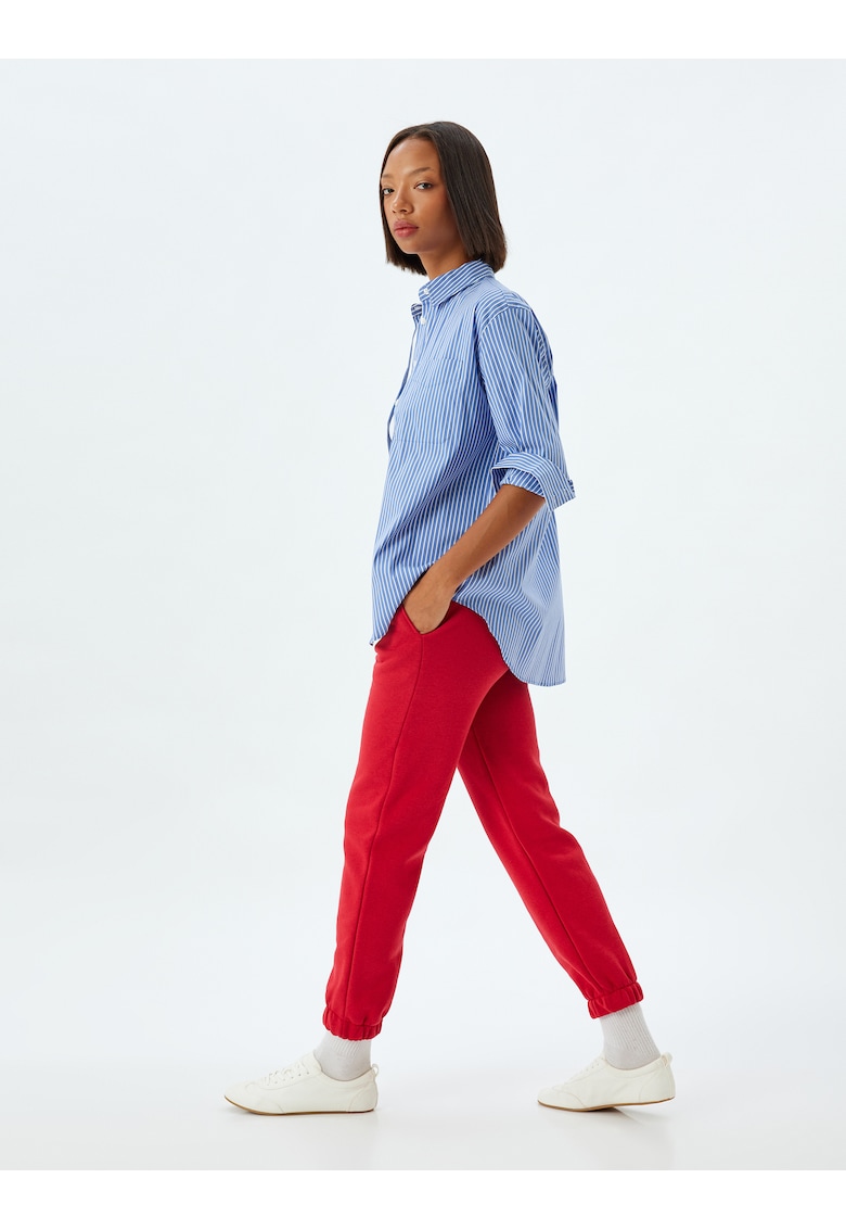 Pantaloni de trening crop cu buzunare oblice