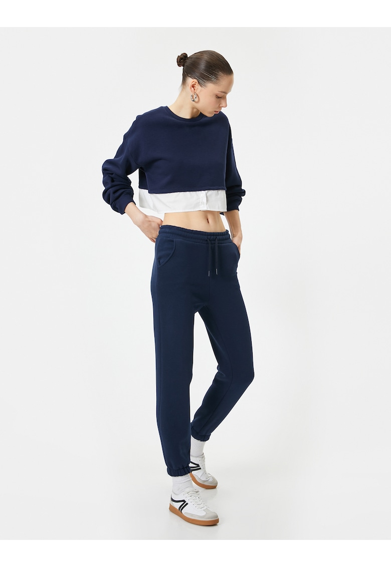 Pantaloni de trening crop cu buzunare oblice